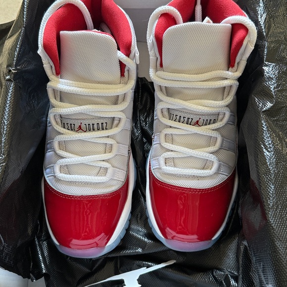Air Jordan 11 Retro White and Red Sneakers - Picture 3 of 6